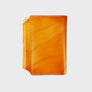 Tan leather wallet with white stitching, image