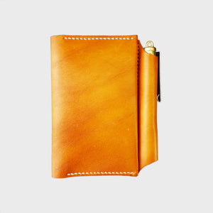 Tan leather wallet with white stitching, image
